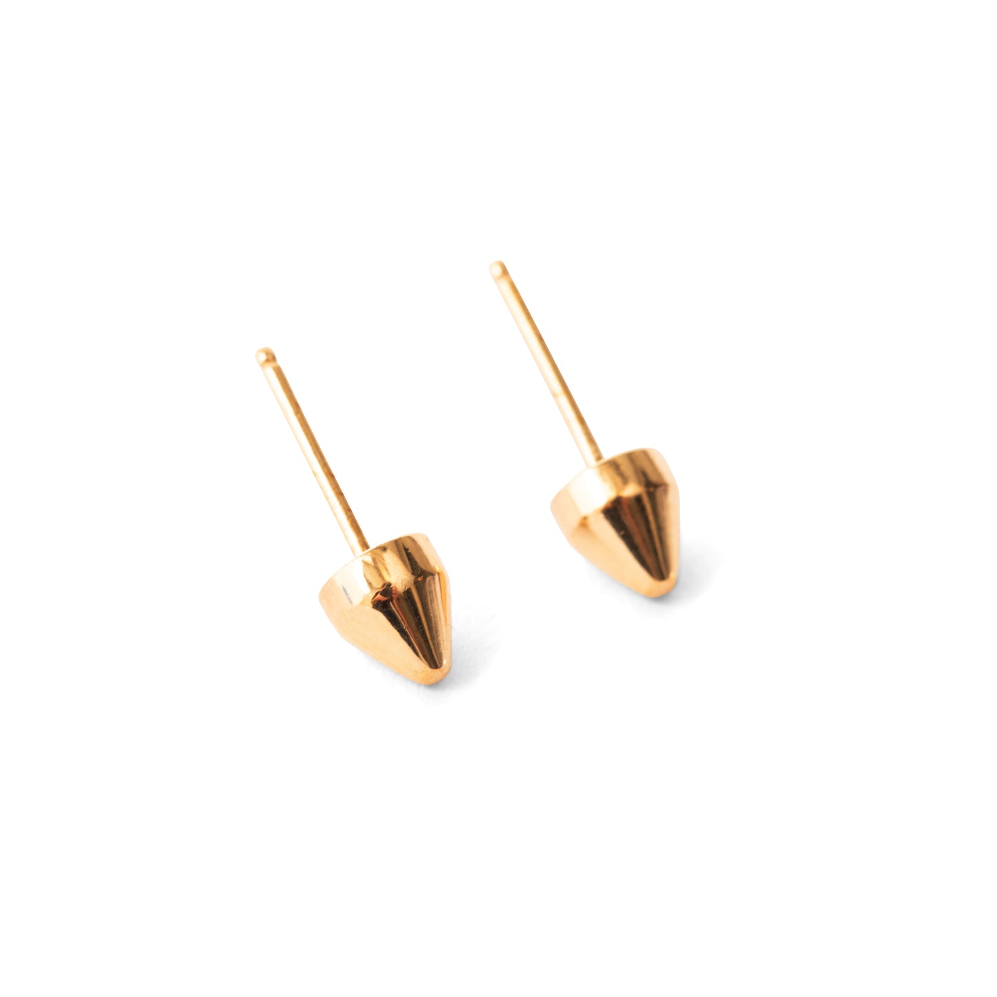astrid pointed stud earrings in gold with white background