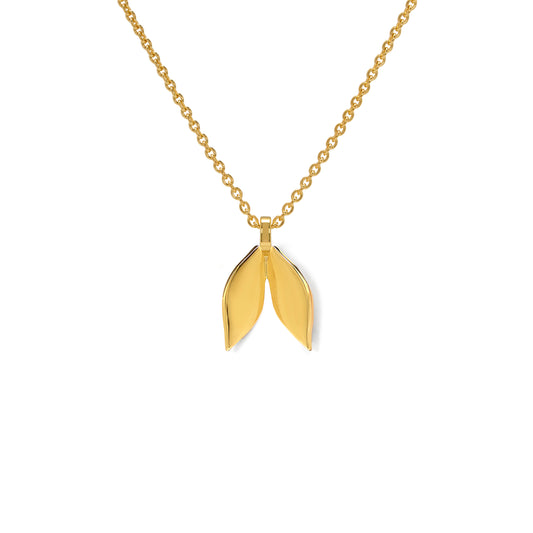 Gold necklace with a leaf-shaped pendant on a white background