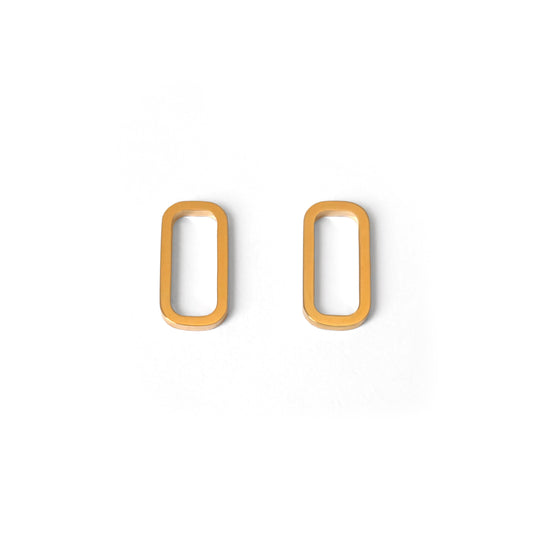 A pair of minimal rectangular geometric earrings in gold vermeil displayed against a white background.