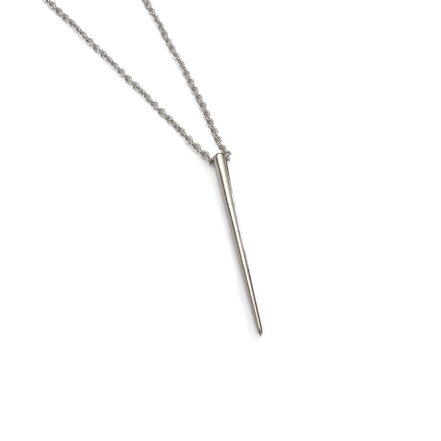 product jewelry photo of silver spike necklace on white background