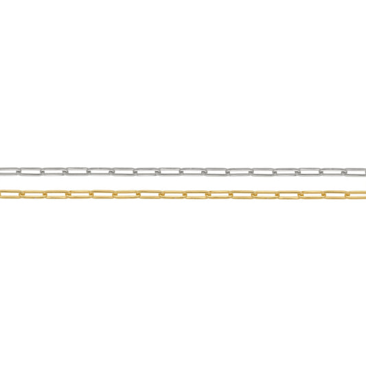 Two metal necklace chains, one silver and one gold, on a white background.