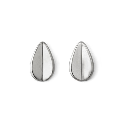 A pair of silver teardrop-shaped earrings with a folded concavity design, displayed against a white background.
