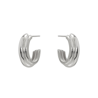 Pair of silver hoop earrings on a white background