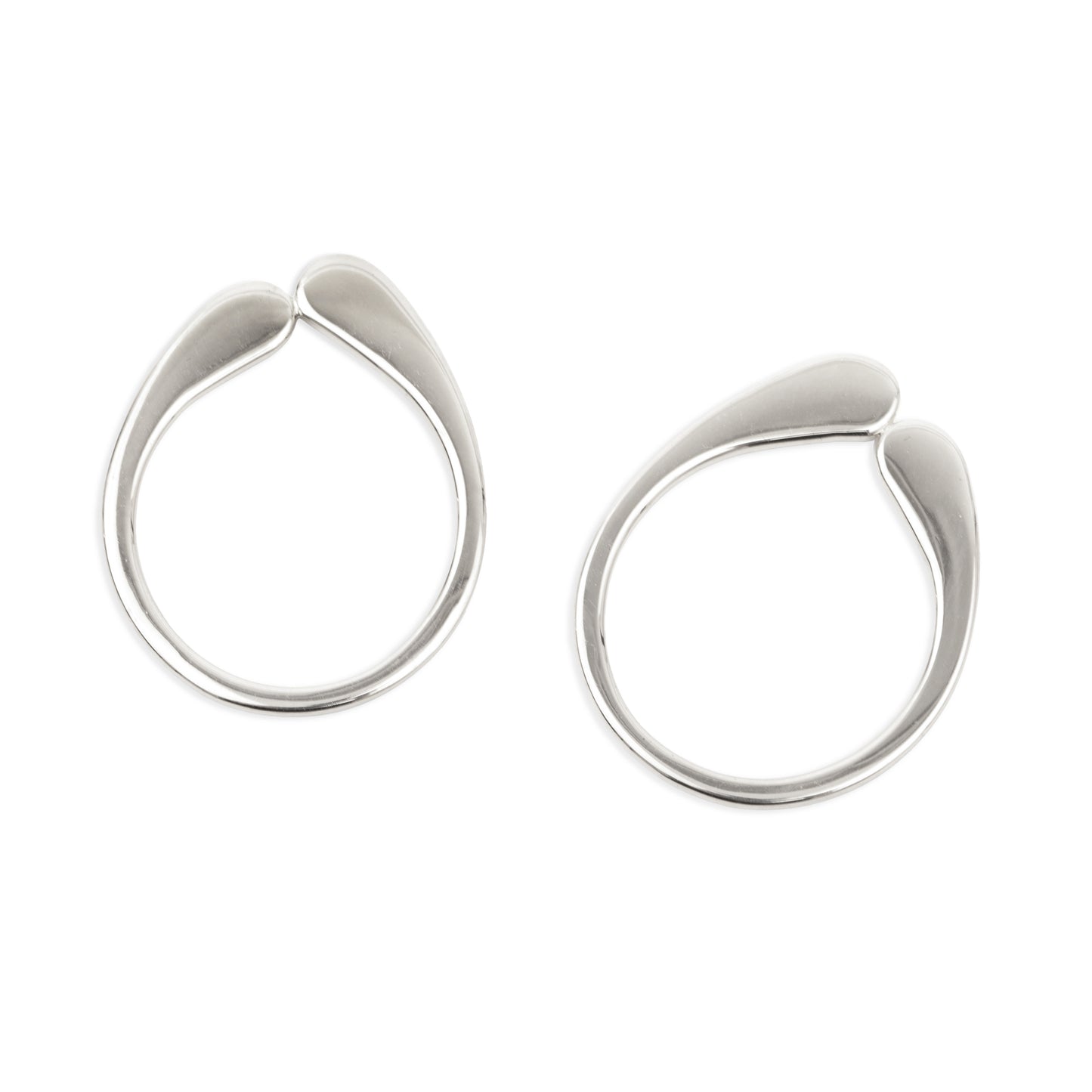 Pair of silver hoop earrings on a white background