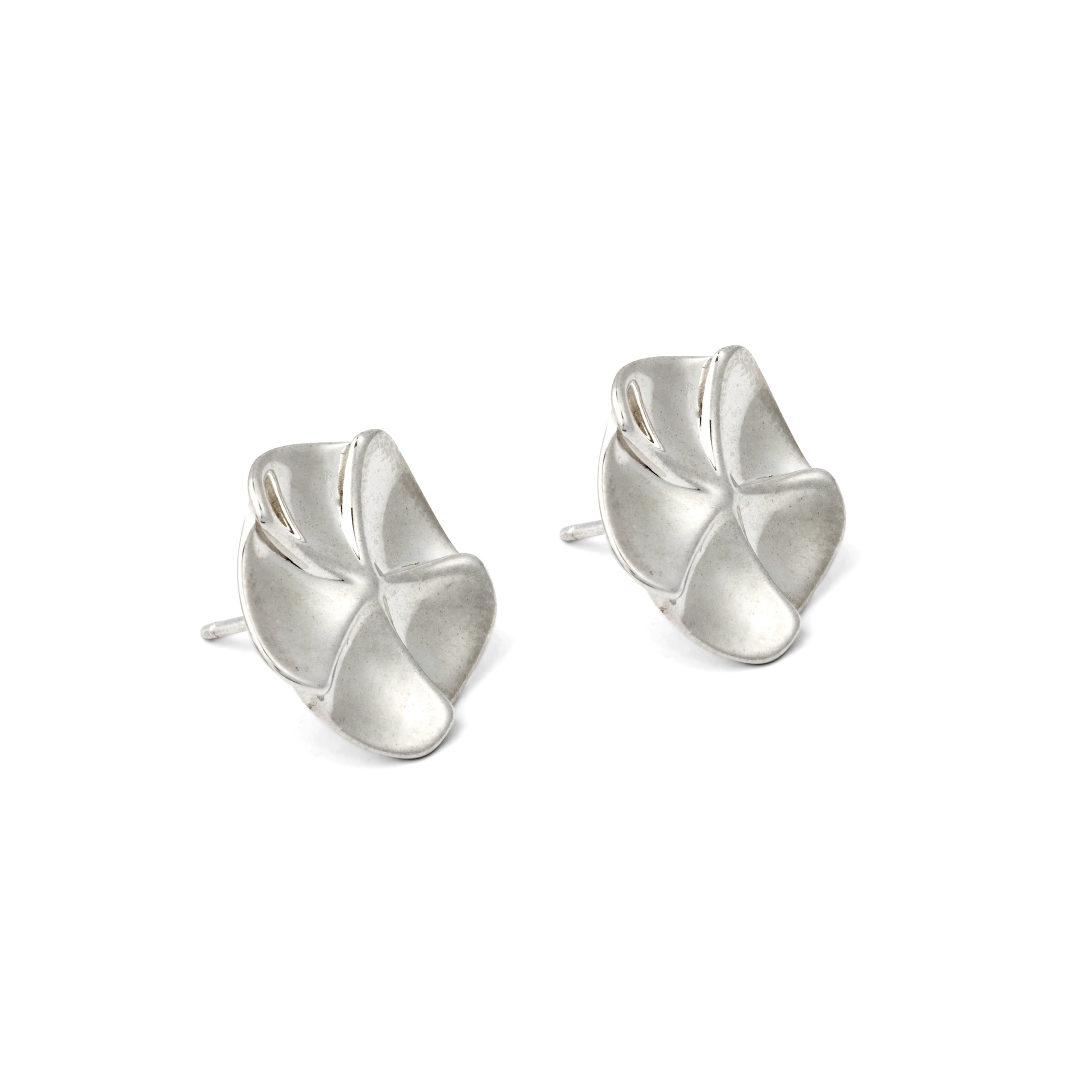 Pair of silver floral earrings on a white background