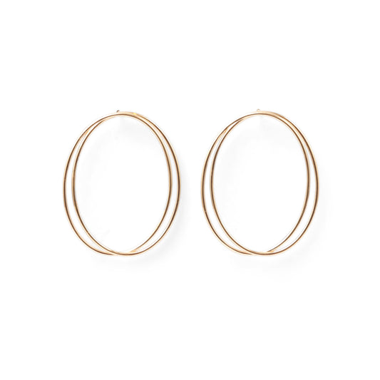 A pair of thin, oval-shaped earrings with a silver finish, displayed against a white background.