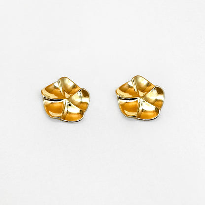 A pair of gold floral design earrings with a post-backing, inspired by flower petals.