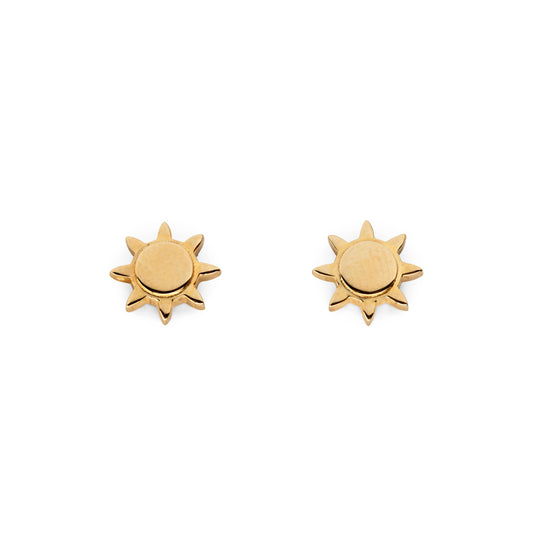 A pair of gold-colored sun stud earrings against a white background.