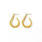 Gold hoop earrings on a white background