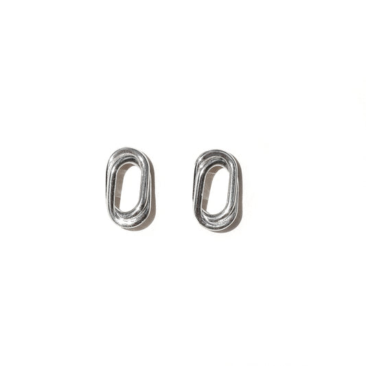 A pair of silver double oval earrings on a white background