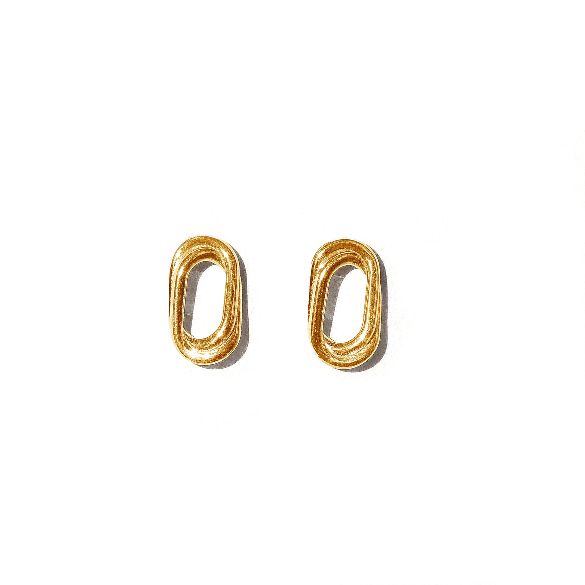 Gold Double Oval Stud Earrings shown against white background