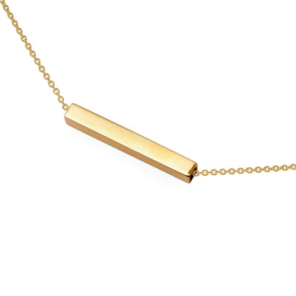 Gold necklace with a horizontal bar pendant on a white background