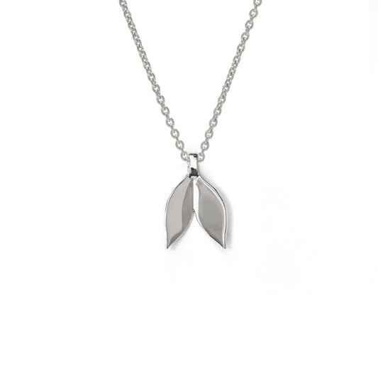 Silver necklace with a leaf-shaped pendant on a white background
