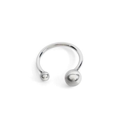 A silver ring with two orbs, one larger and one smaller, against a white background.