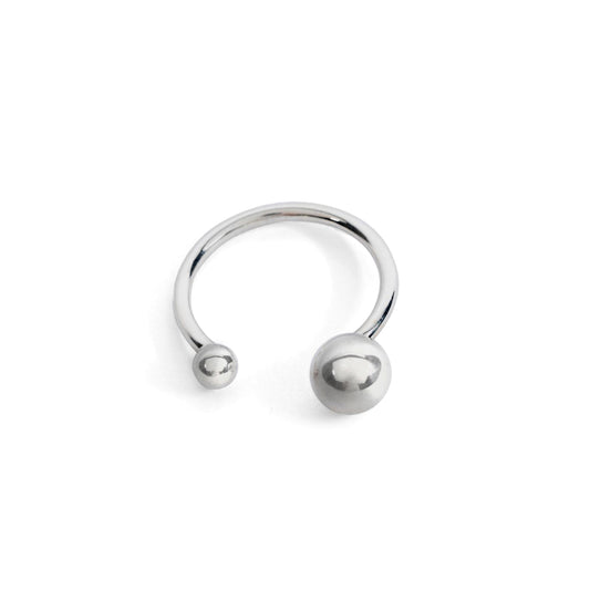 A silver ring with two orbs, one larger and one smaller, against a white background.