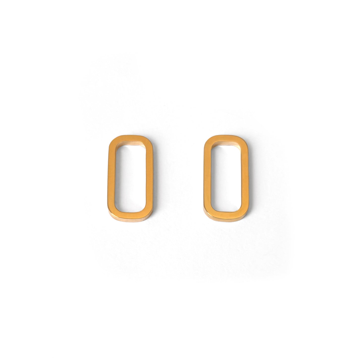 A pair of minimal rectangular geometric earrings in gold vermeil displayed against a white background.