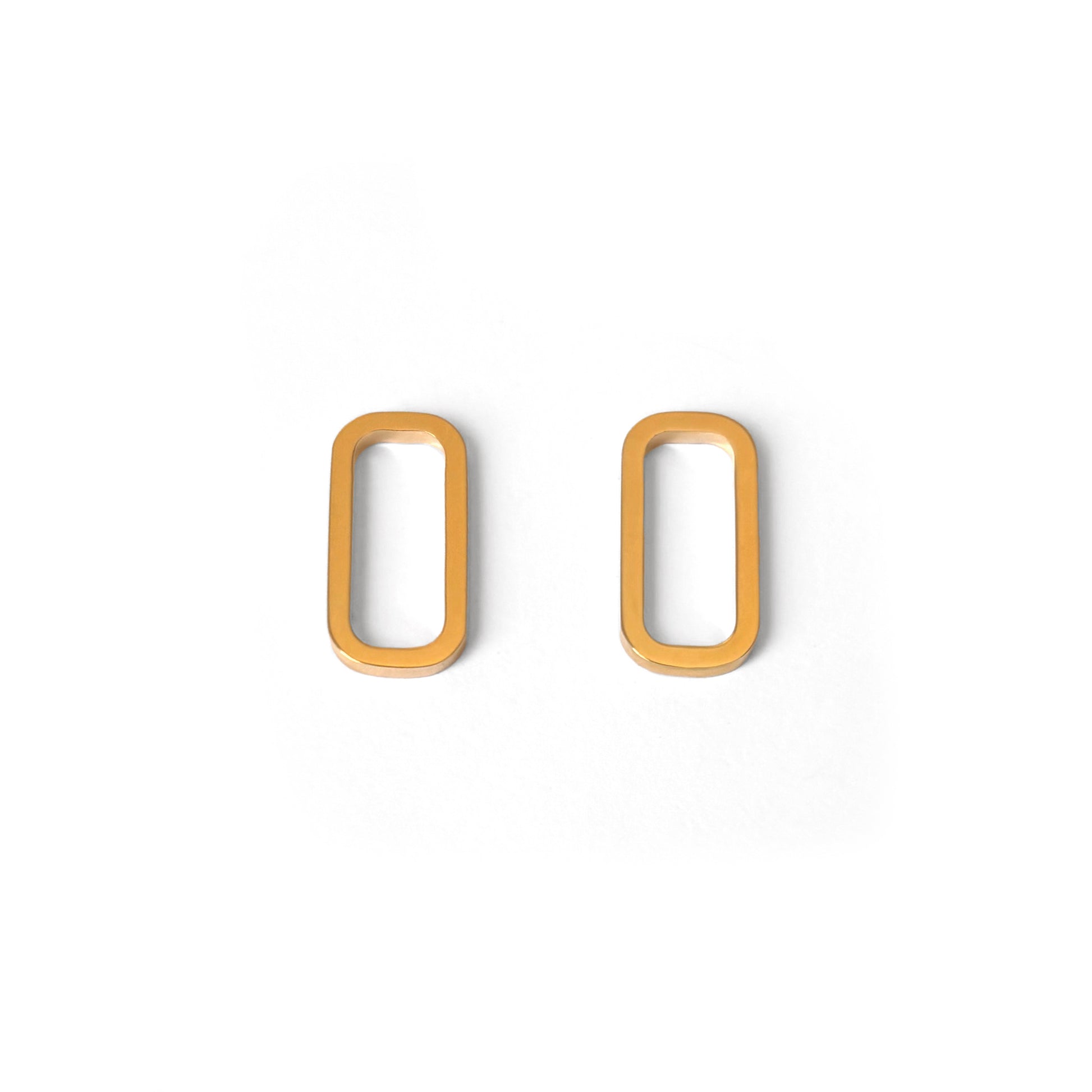 A pair of minimal rectangular geometric earrings in gold vermeil displayed against a white background.