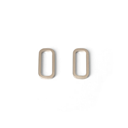 A pair of minimal rectangular geometric earrings in gold vermeil displayed against a white background.