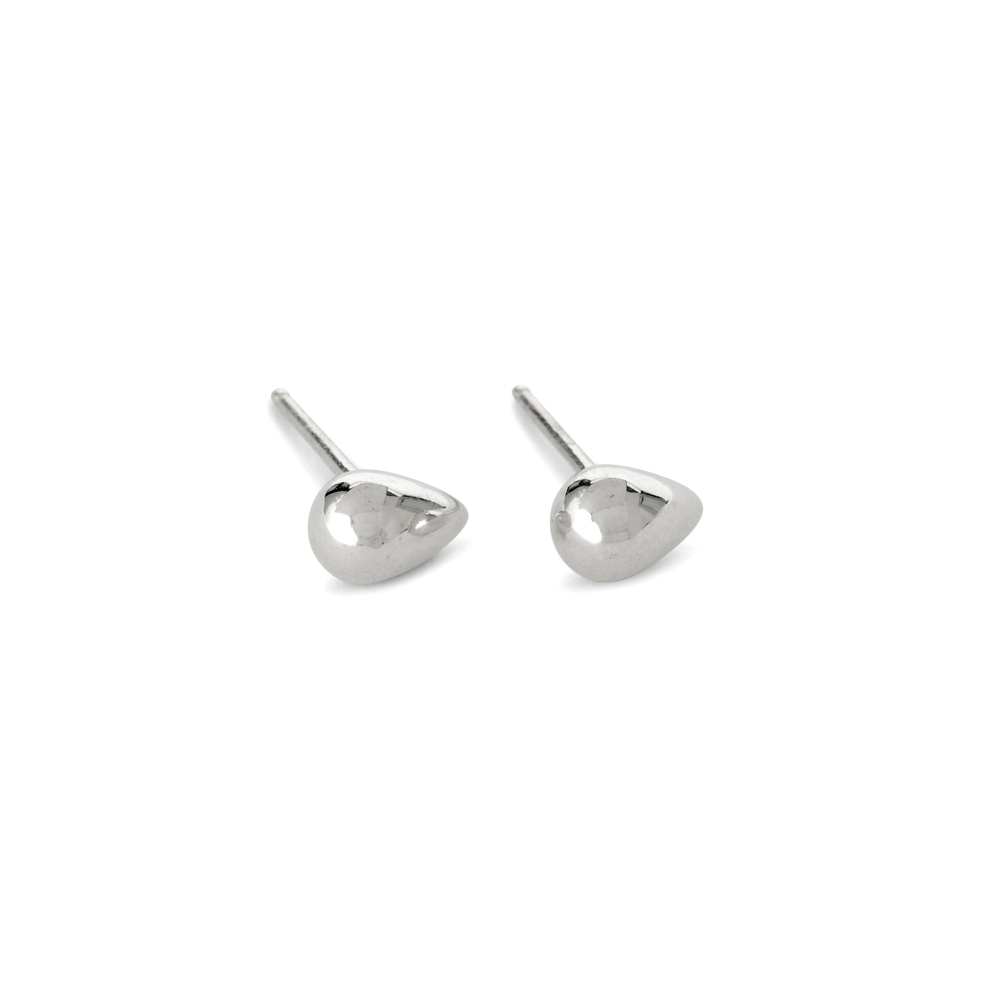 A pair of small silver water droplet stud earrings displayed against a white background.