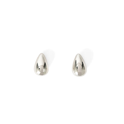 A pair of small silver water droplet stud earrings displayed against a white background.