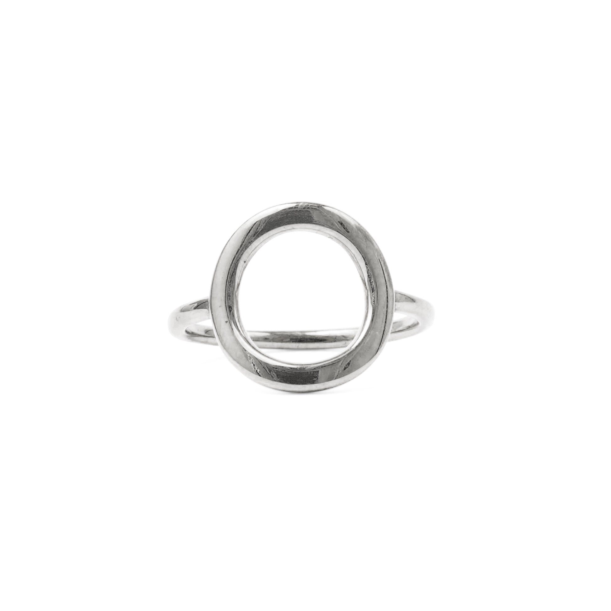 Silver ring with a circle design on a white background