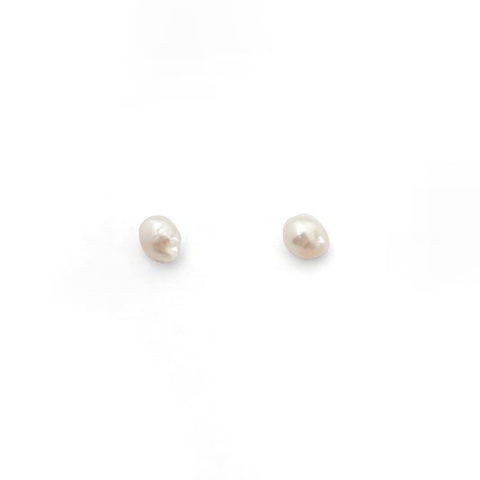 Pair of pearl earrings on a white background