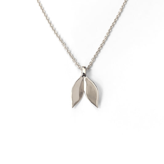 Silver Leaf Necklace Pendant hanging against white background