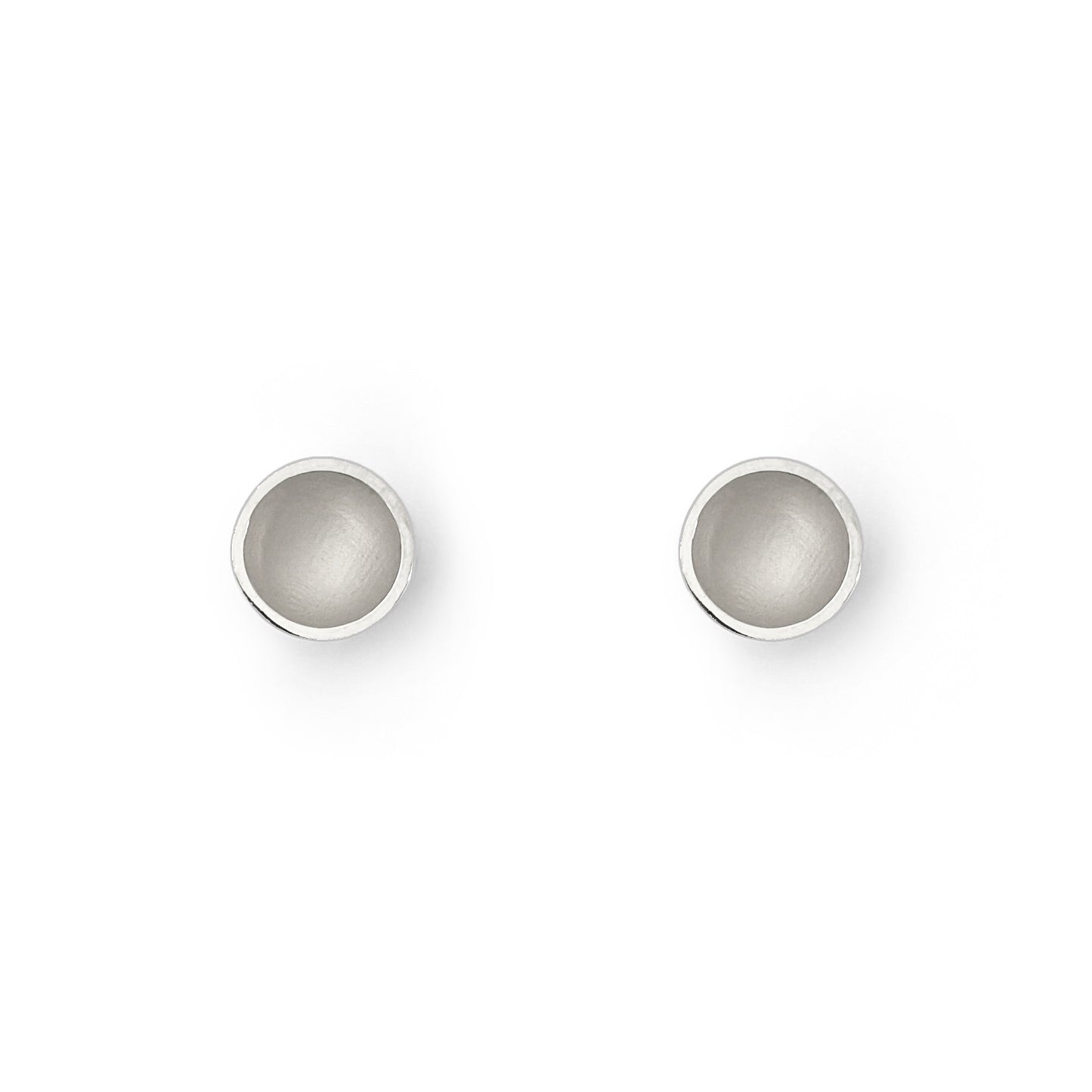 Two small orb earrings on a white background