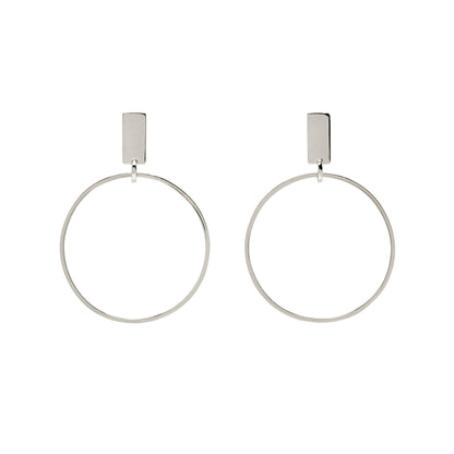 Pair of silver hoop earrings on a white background