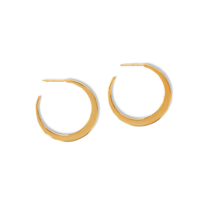A pair of gold hoop earrings on a white background.