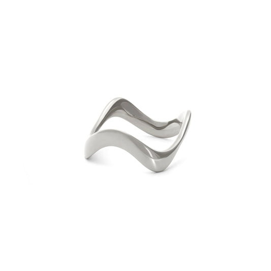 Silver wave-shaped ring on a white background