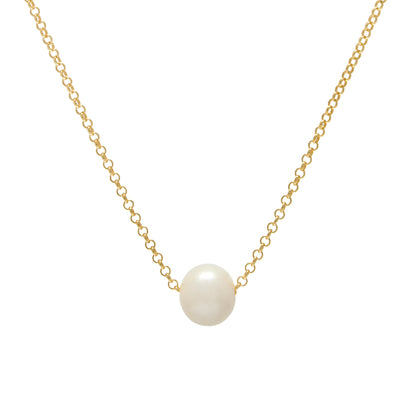 Gold necklace with a single pearl pendant on a white background