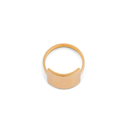 A gold ring with a square shield design against a white background