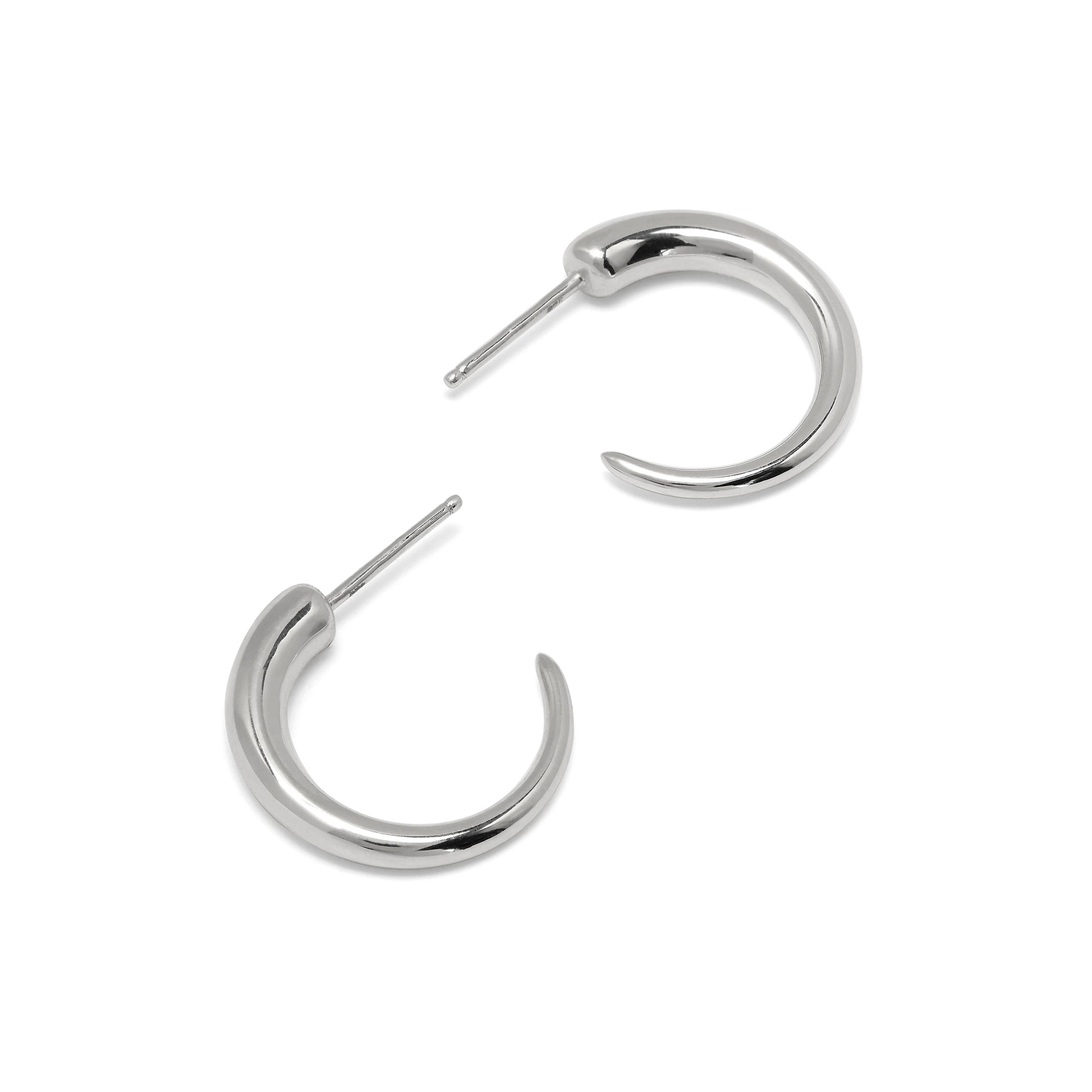 Silver hoop earrings on a white background