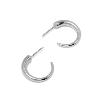 Silver hoop earrings on a white background