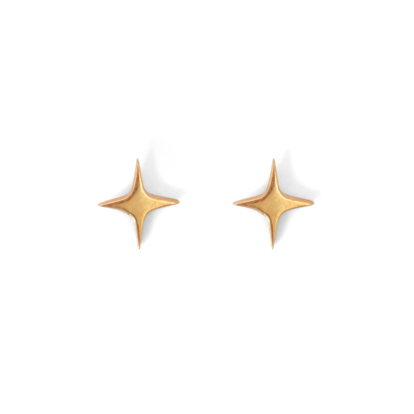 A pair of gold-colored star-shaped stud earrings against a white background.