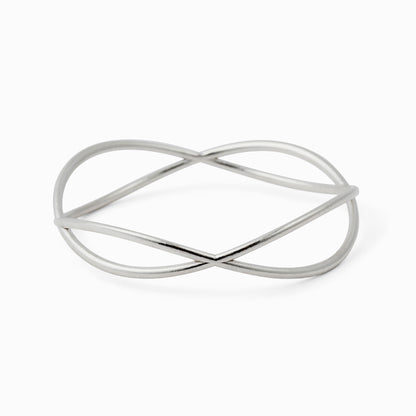 Silver bracelet with a unique design on a white background