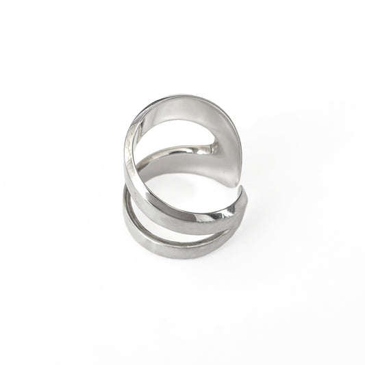 Silver ring with a modern design on a white background