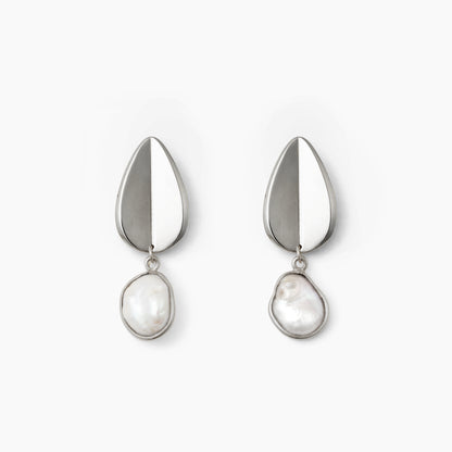 Pair of silver earrings with teardrop-shaped pendants on a white background