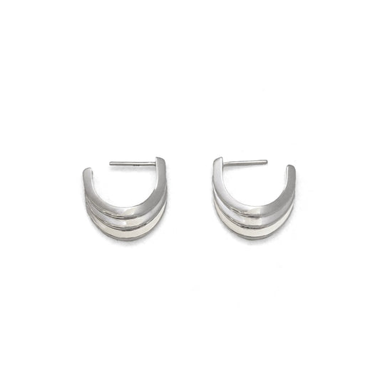 Pair of silver hoop earrings on a white background