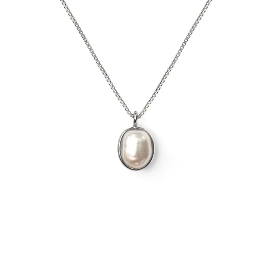 Pearl necklace with silver chain on a white background