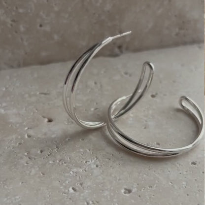Revolve | Crossing Hoop Earrings